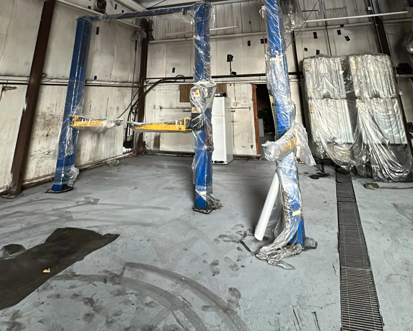 Epoxy Floor Coating in Bellingham, MA — photo 2 — Floor ground and cleaned before the primer