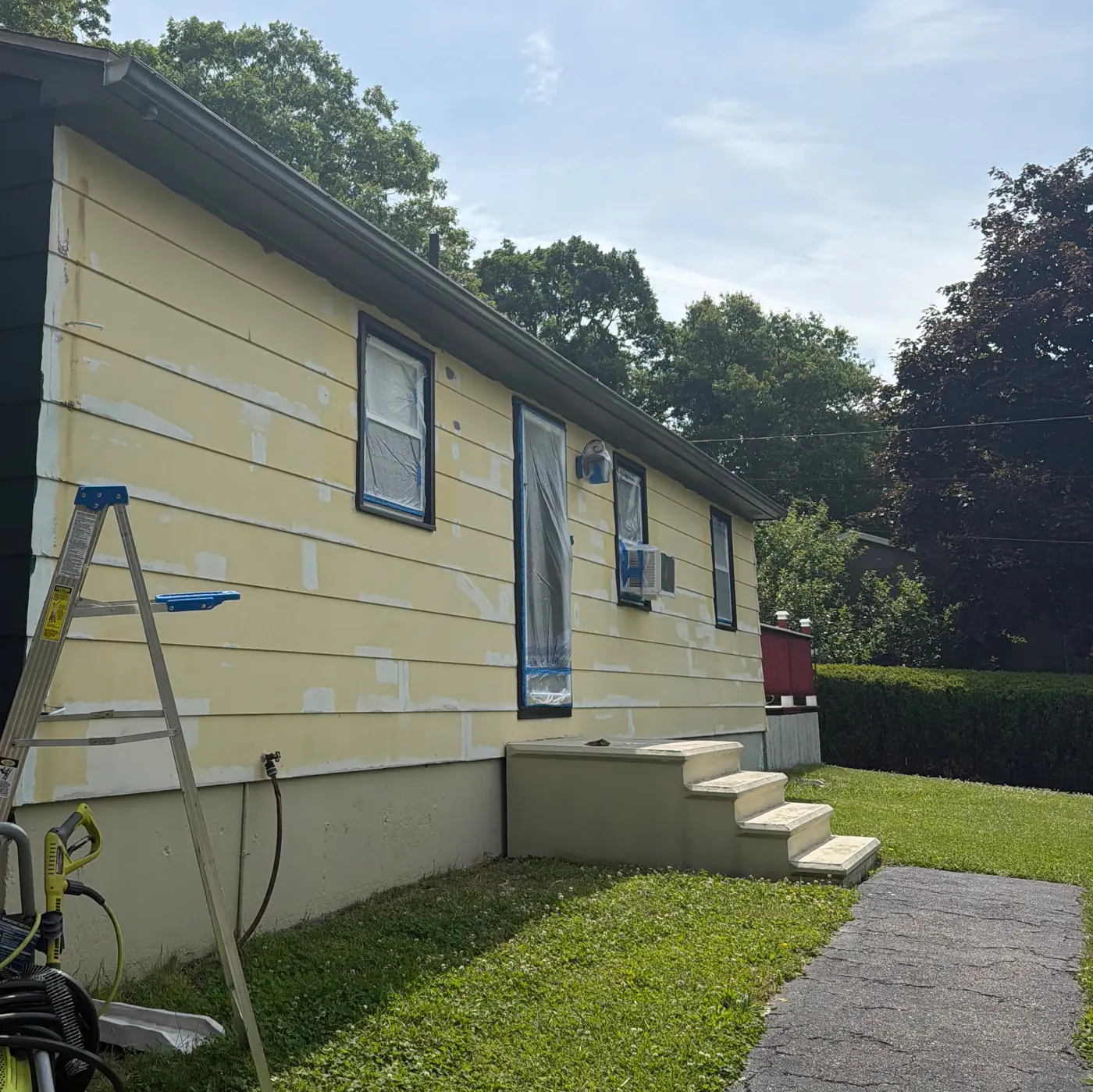 Exterior House Painting in Cumberland, RI — photo 3 — Prep: scraped and patched siding before primer