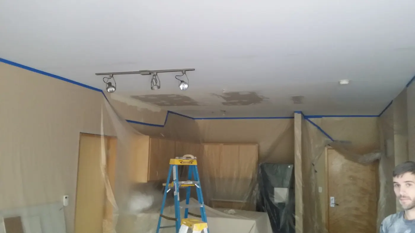 Interior Painting in Cumberland, RI — photo 3 — Masking and floor protection before painting